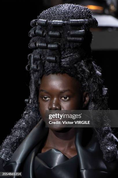 Model walks the runway during the Comme des Garçons Ready to Wear Fall/Winter 2024-2025 fashion show as part of the Paris Fashion Week on March 2,...