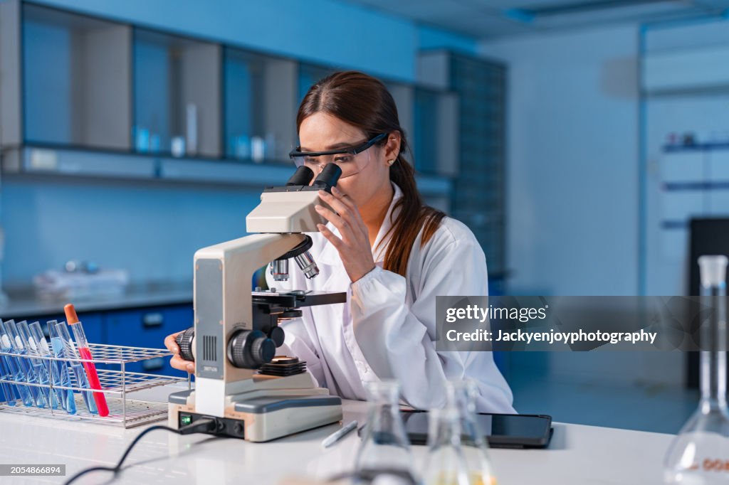 Female Scientist working In Laboratory