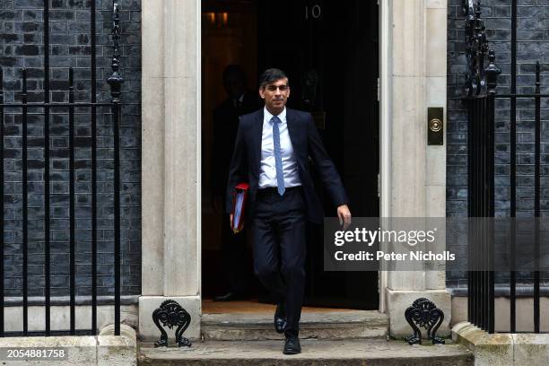 Britain's Prime Minister Rishi Sunak leaves 10 Downing Street to take part in the weekly session of Prime Minister's Questions in the House of...