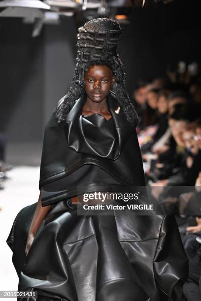 Model walks the runway during the Comme des Garçons Ready to Wear Fall/Winter 2024-2025 fashion show as part of the Paris Fashion Week on March 2,...