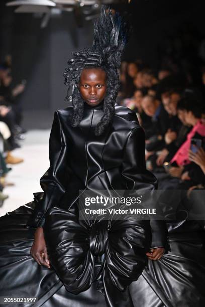 Model walks the runway during the Comme des Garçons Ready to Wear Fall/Winter 2024-2025 fashion show as part of the Paris Fashion Week on March 2,...