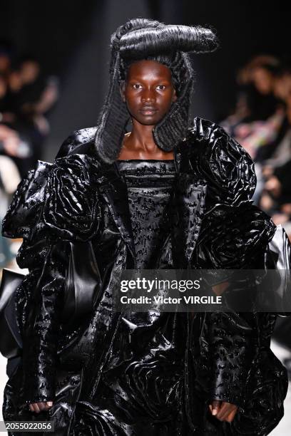 Model walks the runway during the Comme des Garçons Ready to Wear Fall/Winter 2024-2025 fashion show as part of the Paris Fashion Week on March 2,...