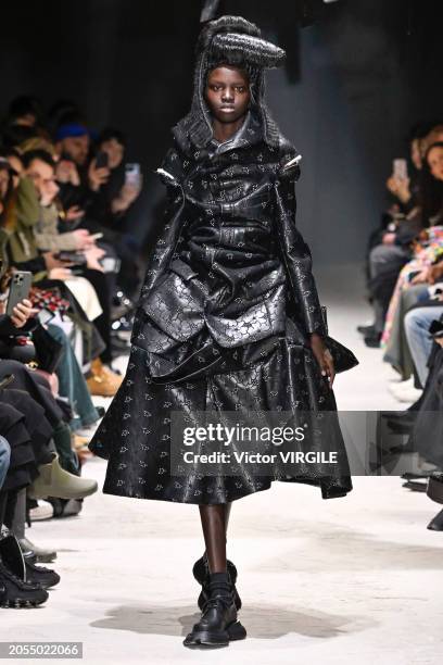 Model walks the runway during the Comme des Garçons Ready to Wear Fall/Winter 2024-2025 fashion show as part of the Paris Fashion Week on March 2,...