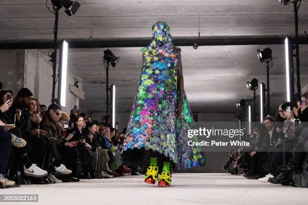 Model walks the runway during the Noir Kei Ninomiya Womenswear Fall/Winter 2024-2025 show as part of Paris Fashion Week on March 02, 2024 in Paris,...