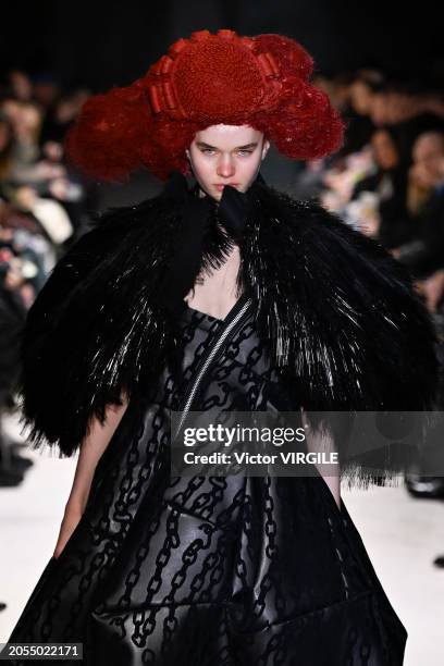 Model walks the runway during the Comme des Garçons Ready to Wear Fall/Winter 2024-2025 fashion show as part of the Paris Fashion Week on March 2,...