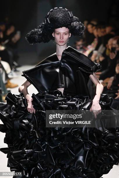 Model walks the runway during the Comme des Garçons Ready to Wear Fall/Winter 2024-2025 fashion show as part of the Paris Fashion Week on March 2,...