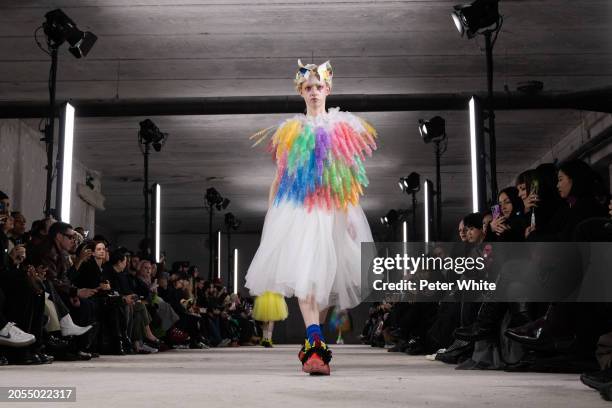 Model walks the runway during the Noir Kei Ninomiya Womenswear Fall/Winter 2024-2025 show as part of Paris Fashion Week on March 02, 2024 in Paris,...