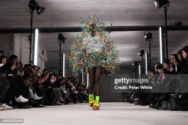 Model walks the runway during the Noir Kei Ninomiya Womenswear Fall/Winter 2024-2025 show as part of Paris Fashion Week on March 02, 2024 in Paris,...