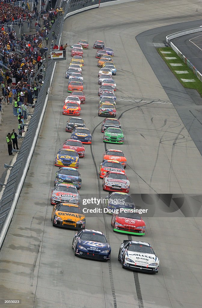 Mbna Racing Ryan Newman driver of the Alltel Penske Racing Dodge Intrepid sits in ...