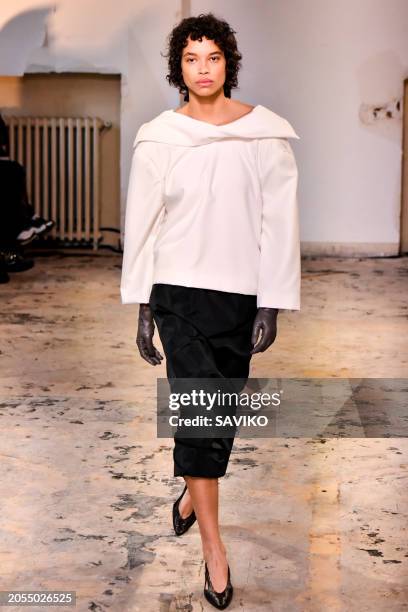 Model walks the runway during the Carven Ready to Wear Fall/Winter 2024-2025 fashion show as part of the Paris Fashion Week on March 2, 2024 in...