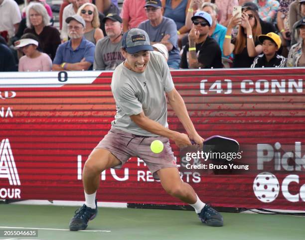 Connor Garnett hits a backhand drive shot against Ben Johns in the 2024 PPA Carvana Mesa Arizona Cup semi-finals match of the Pro Men's Singles...