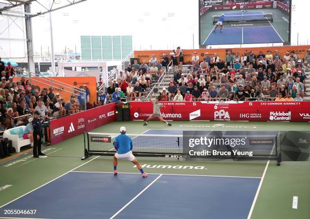 Connor Garnett hits a forehand drive shot down the line against Ben Johns in the 2024 PPA Carvana Mesa Arizona Cup semi-finals match of the Pro Men's...