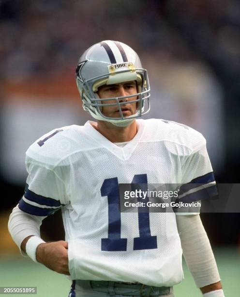 Quarterback Danny White of the Dallas Cowboys looks on from the field before a game against the Cincinnati Bengals at Riverfront Stadium on December...