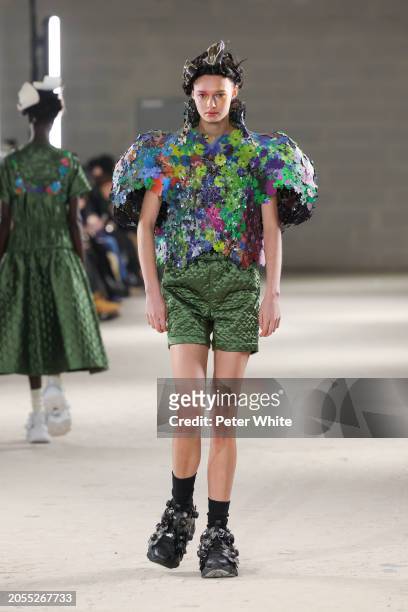 Model walks the runway during the Noir Kei Ninomiya Womenswear Fall/Winter 2024-2025 show as part of Paris Fashion Week on March 02, 2024 in Paris,...