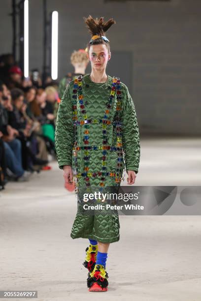 Model walks the runway during the Noir Kei Ninomiya Womenswear Fall/Winter 2024-2025 show as part of Paris Fashion Week on March 02, 2024 in Paris,...