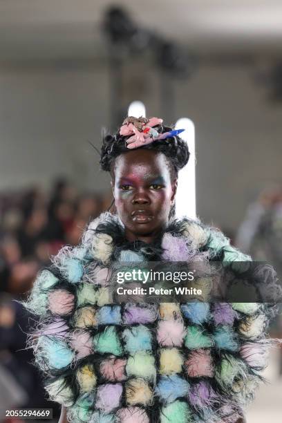 Model walks the runway during the Noir Kei Ninomiya Womenswear Fall/Winter 2024-2025 show as part of Paris Fashion Week on March 02, 2024 in Paris,...