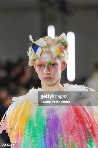 Model walks the runway during the Noir Kei Ninomiya Womenswear Fall/Winter 2024-2025 show as part of Paris Fashion Week on March 02, 2024 in Paris,...