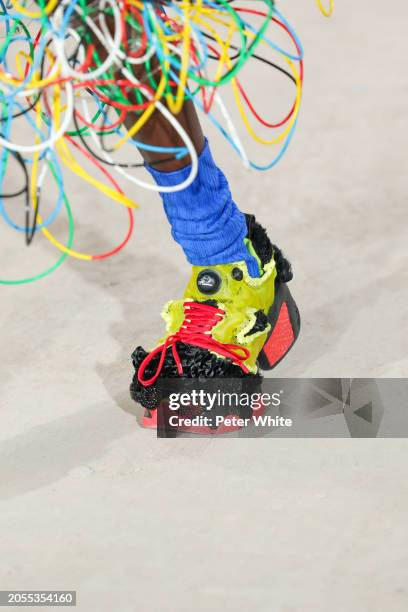 Model, shoe detail, walks the runway during the Noir Kei Ninomiya Womenswear Fall/Winter 2024-2025 show as part of Paris Fashion Week on March 02,...