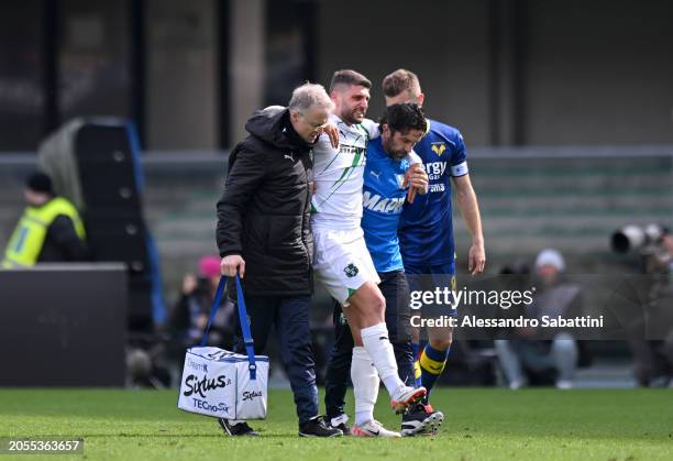 Domenico Berardi of US Sassuolo is helped off the field due to an injury during the Serie A TIM match between Hellas Verona FC and US Sassuolo -...