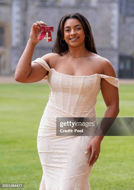 British gymnast Elissa Downie after being made A Member of the Order of the British Empire during an investiture ceremony at Windsor Castle on March...