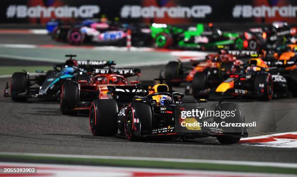 Max Verstappen of the Netherlands driving the Oracle Red Bull Racing RB20 leads Charles Leclerc of Monaco driving the Ferrari SF-24 during the F1...