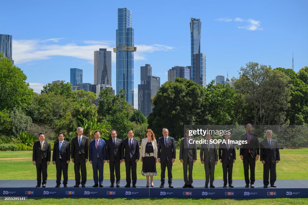 (L-R) ASEAN Secretary-General Kao Kim Hourn, Vietnam's Prime...