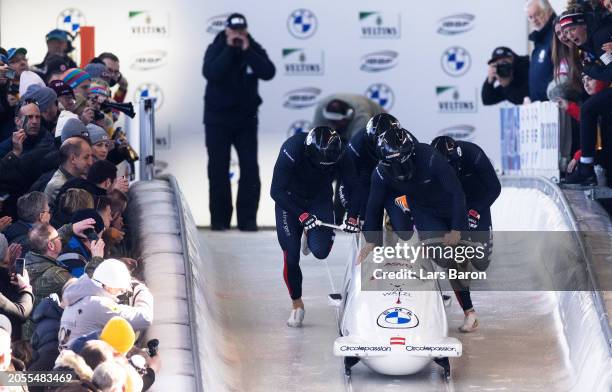 Markus Treichl, Sascha Stepan, Markus Sammer and Kristian Huber of Austria compete during their third run of the 4-man Bobsleigh competition at the...