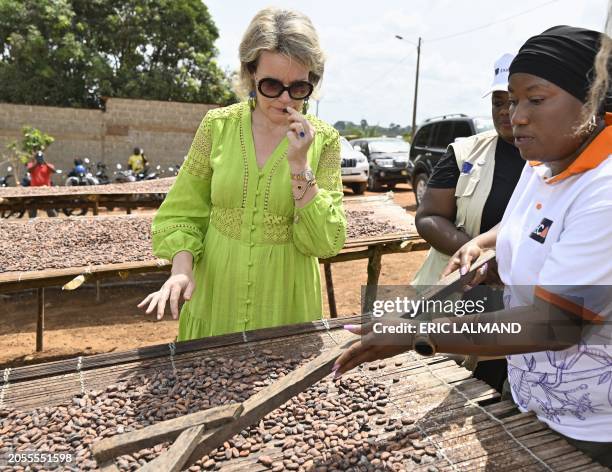 Queen Mathilde of Belgium receives a guided tour at a visit of ECAM cocoa cooperative in Meagui, during a royal working visit to Ivory Coast, in San...