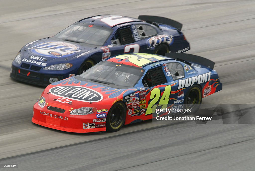 Jeff Gordon in his Dupont Chevrolet passes Rusty Wallace in his... News ...