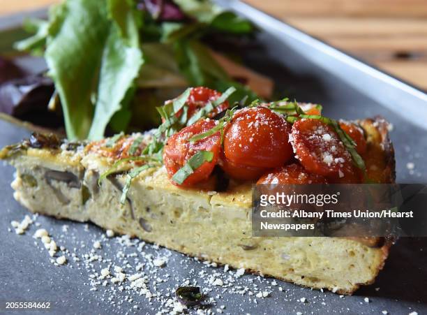 Garden frittata at Farmers Hardware restaurant on Wednesday, July 26, 2017 in Saratoga Springs, N.Y. This includes sauteed asparagus, mushrooms,...