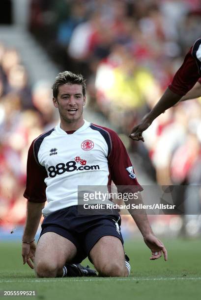 August 22: Franck Queudrue of Middlesbrough celebrates during the Premier League match between Arsenal and Middlesbrough at Highbury on August 22,...