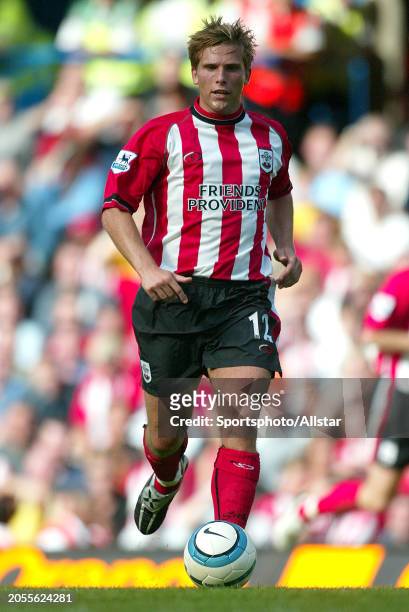 August 28: Anders Svensson of Southampton on the ball during the Premier League match between Chelsea and Southampton at Stamford Bridge on August...