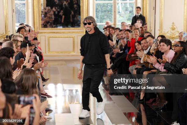Fashion designer Pierpaolo Piccioli acknowledges the applause of the audience during the Valentino Womenswear Fall/Winter 2024-2025 show as part of...