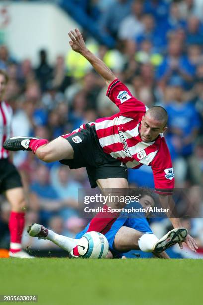 August 28: David Prutton of Southampton and Tiago of Chelsea challenge during the Premier League match between Chelsea and Southampton at Stamford...