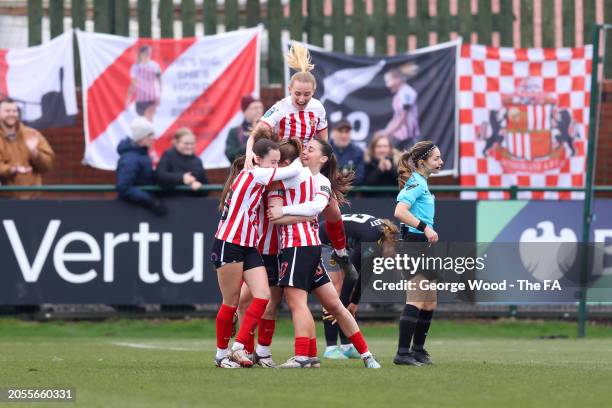 Mary McAteer of Sunderland celebrates scoring her team's first goal with teammates during the Barclays Women's Championship match between Sunderland...