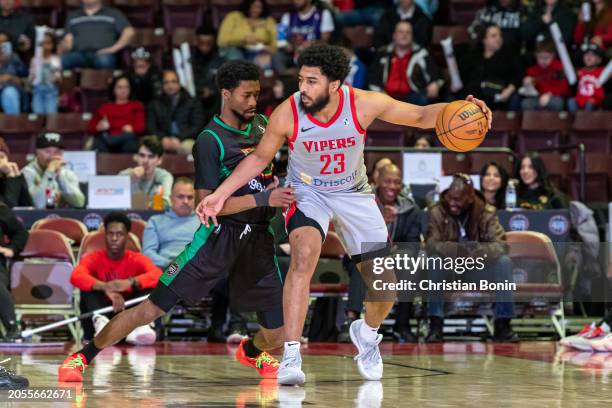 Kobi Simmons of the Raptors 905 attempts to impede a ball handling Josh Reaves of the Rio Grande Valley Vipers during an NBA G League game at the...