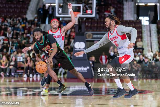 Javon Freeman-Liberty of the Raptors 905 drives the ball through two defenders during an NBA G League game against the Rio Grande Valley Vipers at...