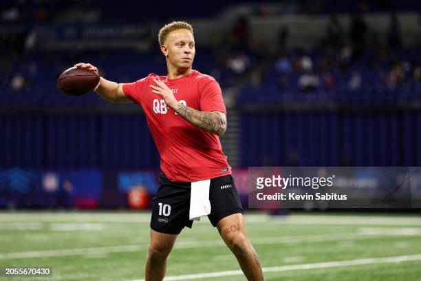 Spencer Rattler #QB10 of South Carolina participates in a drill during the NFL Combine at the Lucas Oil Stadium on March 2, 2024 in Indianapolis,...