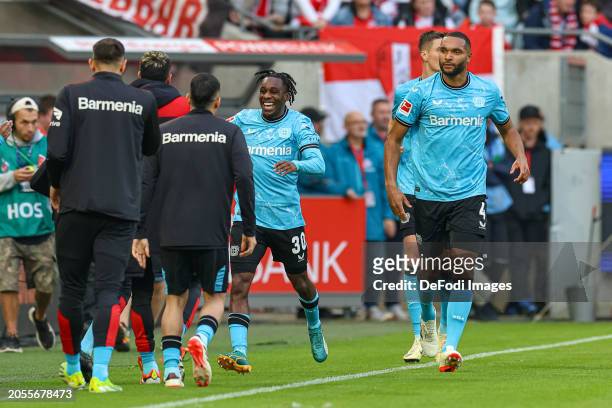 Jeremie Frimpong of Bayer 04 Leverkusen celebrates after scoring his team's first goal with teammates during the Bundesliga match between 1. FC Köln...