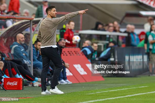 Head coach Xabier Alonso of Bayer 04 Leverkusen gestures during the Bundesliga match between 1. FC Köln and Bayer 04 Leverkusen at...