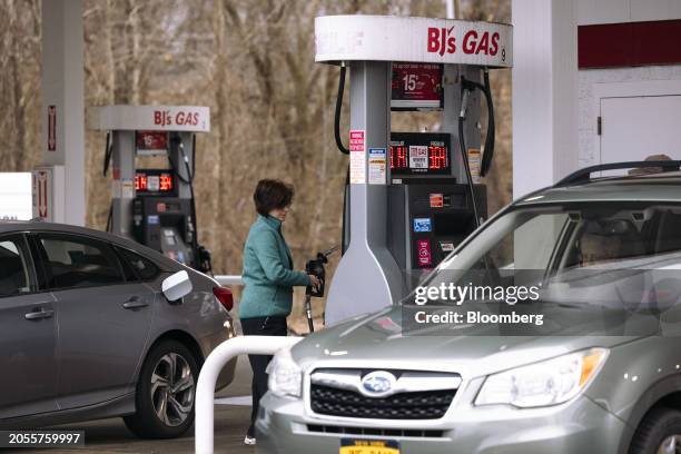 Customer at a BJ's gas station outside a BJ's Wholesale Club location in Albany, New York, US, on Monday, March 4, 2024. BJ's Wholesale Club Holdings...