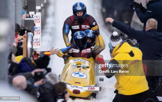 Adam Ammour, Issam Ammour, Benedikt Hertel and Rupert Schenk of Germany celebrate after their final run of the 4-man Bobsleigh competition at the BMW...