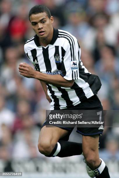 August 28: Jermaine Jenas of Newcastle United on the ball during the Premier League match between Aston Villa and Newcastle United at Villa Park on...