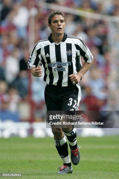 August 28: Laurent Robert of Newcastle United running during the Premier League match between Aston Villa and Newcastle United at Villa Park on...
