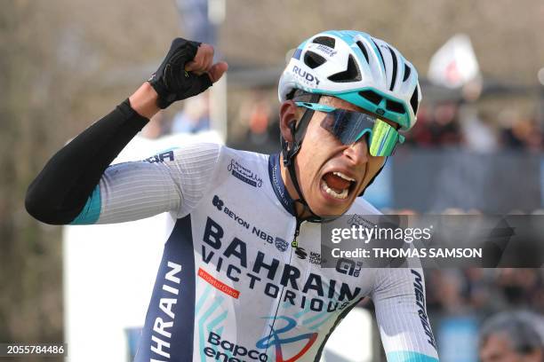 Bahrain Victorious's Colombian cyclist Santiago Buitrago celebrates as he crosses the finish line to win the 4th stage of the Paris-Nice cycling...
