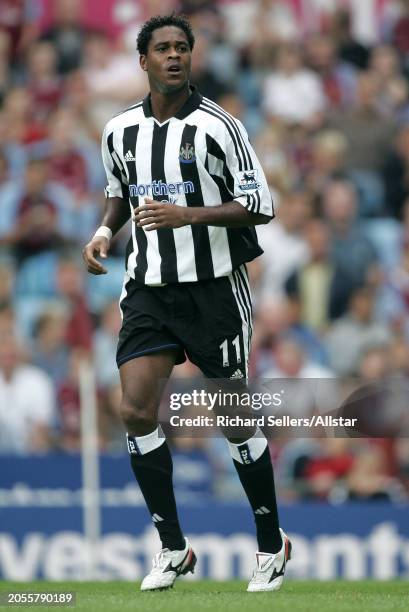 August 28: Patrick Kluivert of Newcastle United running during the Premier League match between Aston Villa and Newcastle United at Villa Park on...