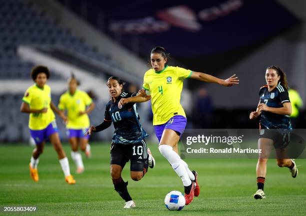 Rafaelle of Brazil controls the ball ahead of Dalila Ippolito of Argentina at BMO Stadium on March 02, 2024 in Los Angeles, California.