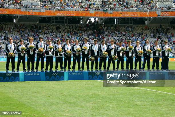 August 28: Argentina players with Olympic Gold Medals after the Mens Football Gold Contest Olympic Final match between Argentina and Paraguay at...