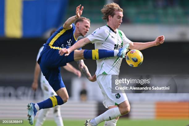 Ondrej Duda of Hellas Verona competes for the ball with Kristian Thorstvedt of US Sassuolo during the Serie A TIM match between Hellas Verona FC and...
