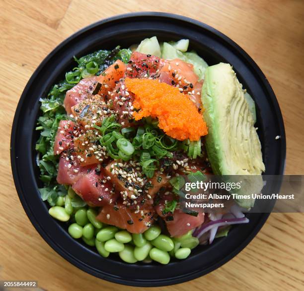 Protein poke bowl at Bespoki Bowl at 122 Forth St. On Friday, Jan. 19, 2018 in Troy, N.Y. Half tuna and half salmon base, yuzu ponzu marinade, spicy...